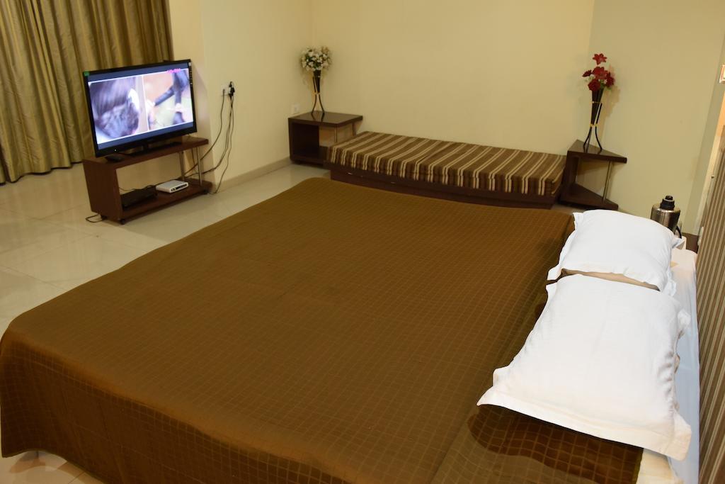 Jai Residency Otel Gāndhīdhām Oda fotoğraf